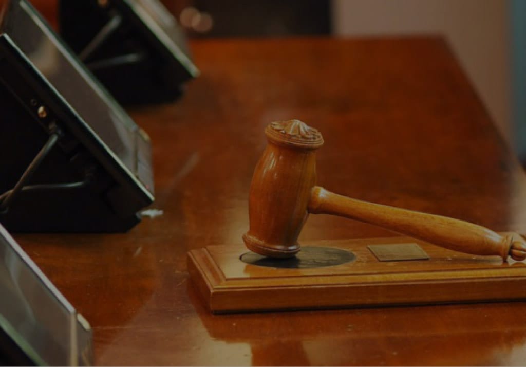 dunnion_law_background_big A gavel rests on a desk
